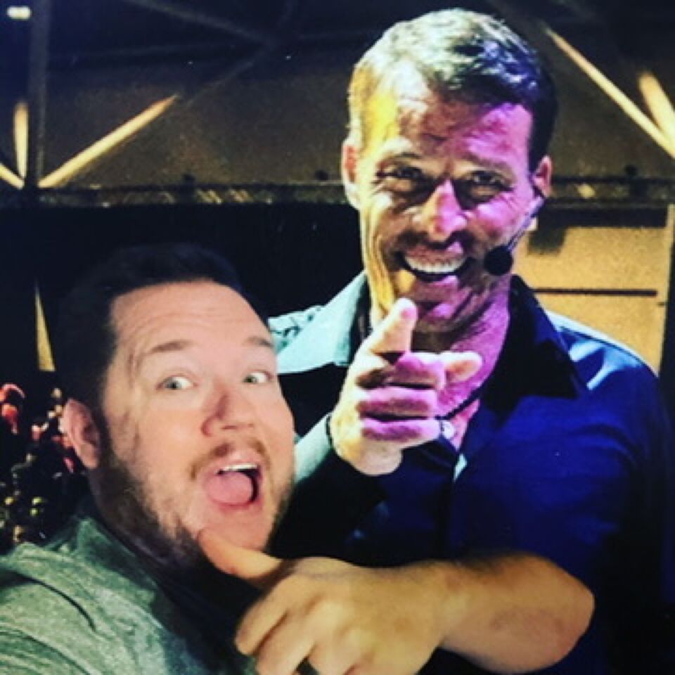 JJ and a speaker at a live event