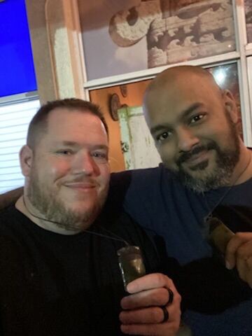 JJ and a guest at an evening event
